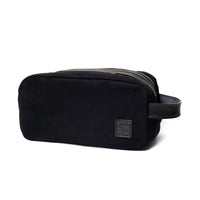 Necessaire Lona Encerada e Couro Preta, vista frontal – DANTE Capelli