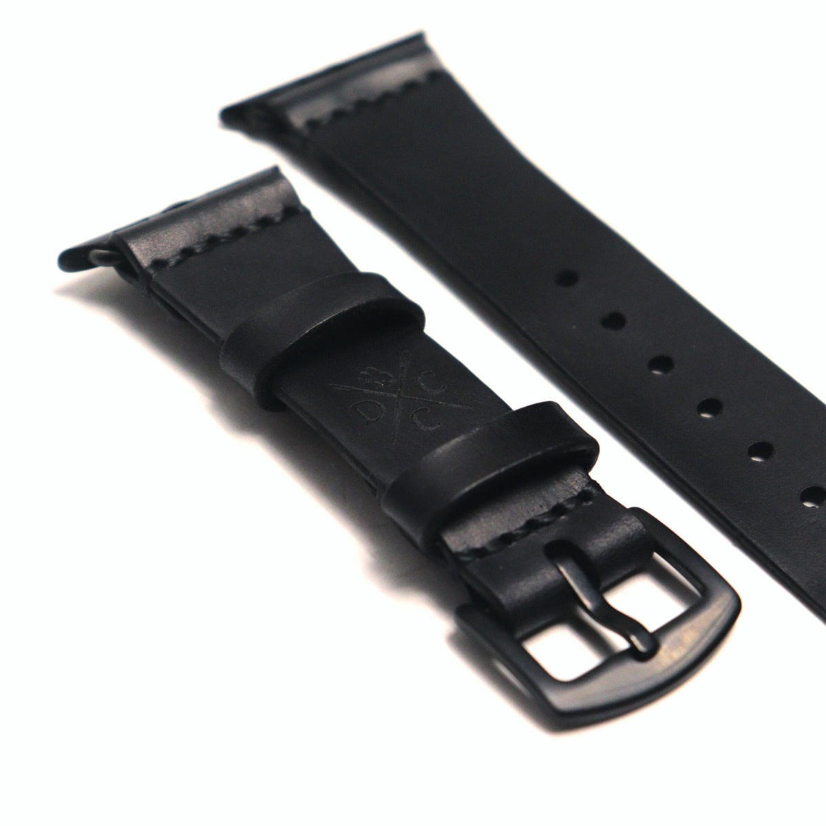 Pulseira de Couro Apple Watch Preta, still sobre superfície neutra – DANTE Capelli